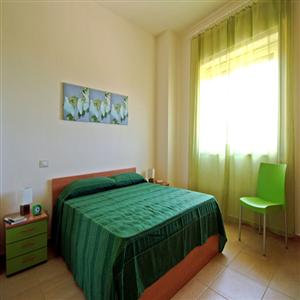 Green Apartment Bedroom