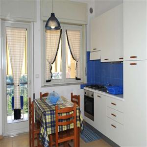 Blue Apartment Dining & Kitchen Area