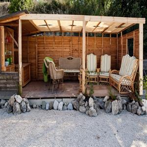 summer house with outdoor kitchen