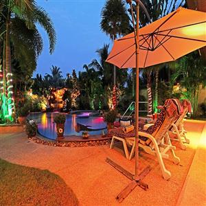 Sunbathing area by the Poolside in the evening