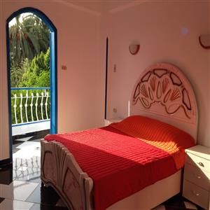 main bedroom with balcony / apartment 2nd floor