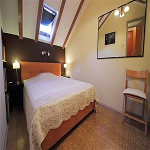 Three-Bedroom Apartment: Bedroom