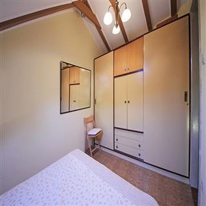 Three-Bedroom Apartment: Bedroom