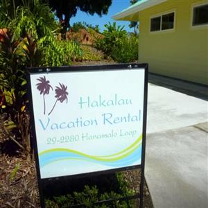 Sign at driveway entrance to the rental.