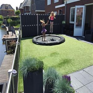 Garden with trampoline