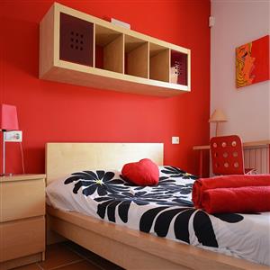Bedroom with access to a terrace and swimming pool