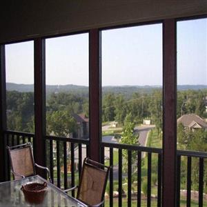 Screened In Porch. Can see Pool from here.