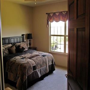 Entry level Master Bedroom with King bed.