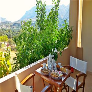 Veranda with mountain view,having your tea.