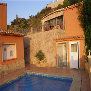 Outdoor shower and outdoor toilet.