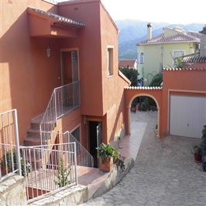 Separate entrances to the main house and apartment