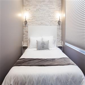 The Elora Suite - Bed with beautiful stone